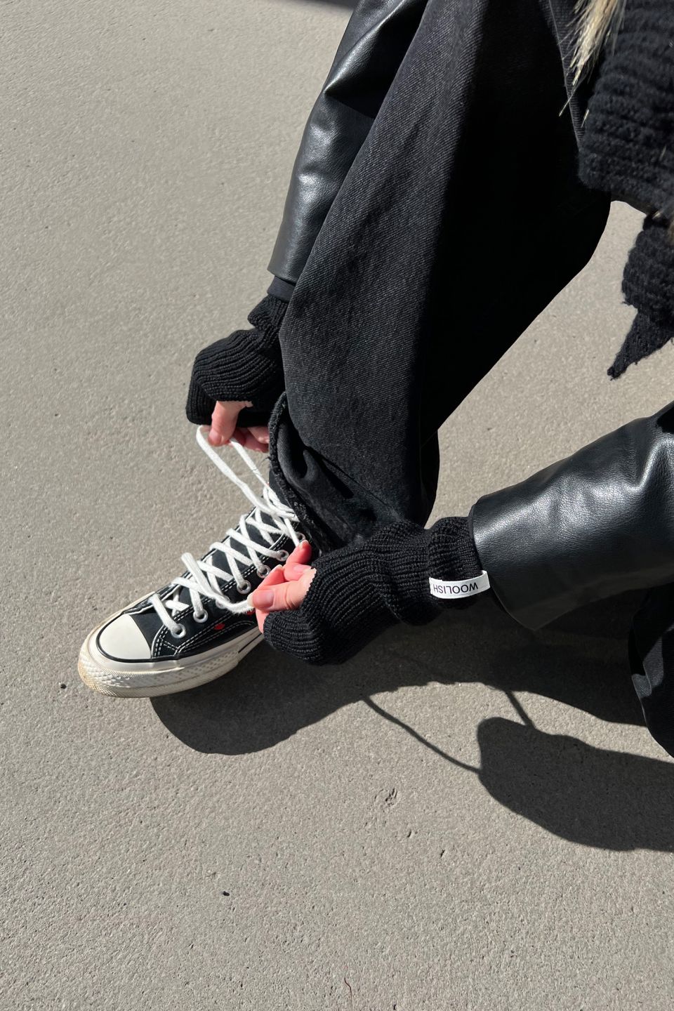 Iki meriino randmesoojendajad mustad