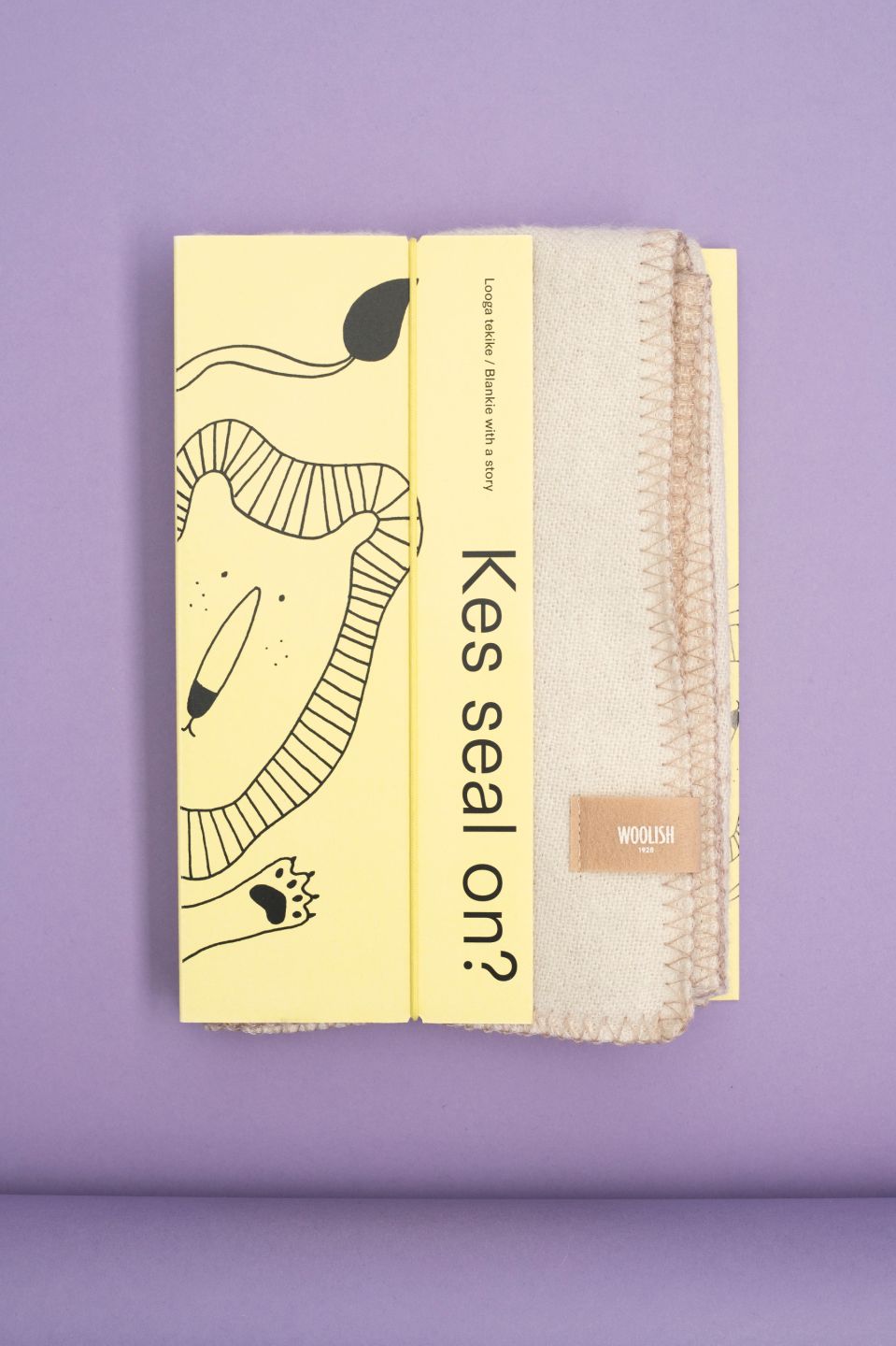 Kes seal on? Lõvi meriinotekike beež / valge